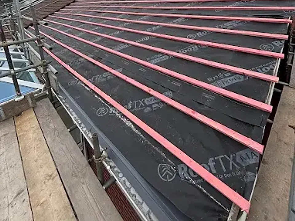New roof membrane and battens on a pitched roof