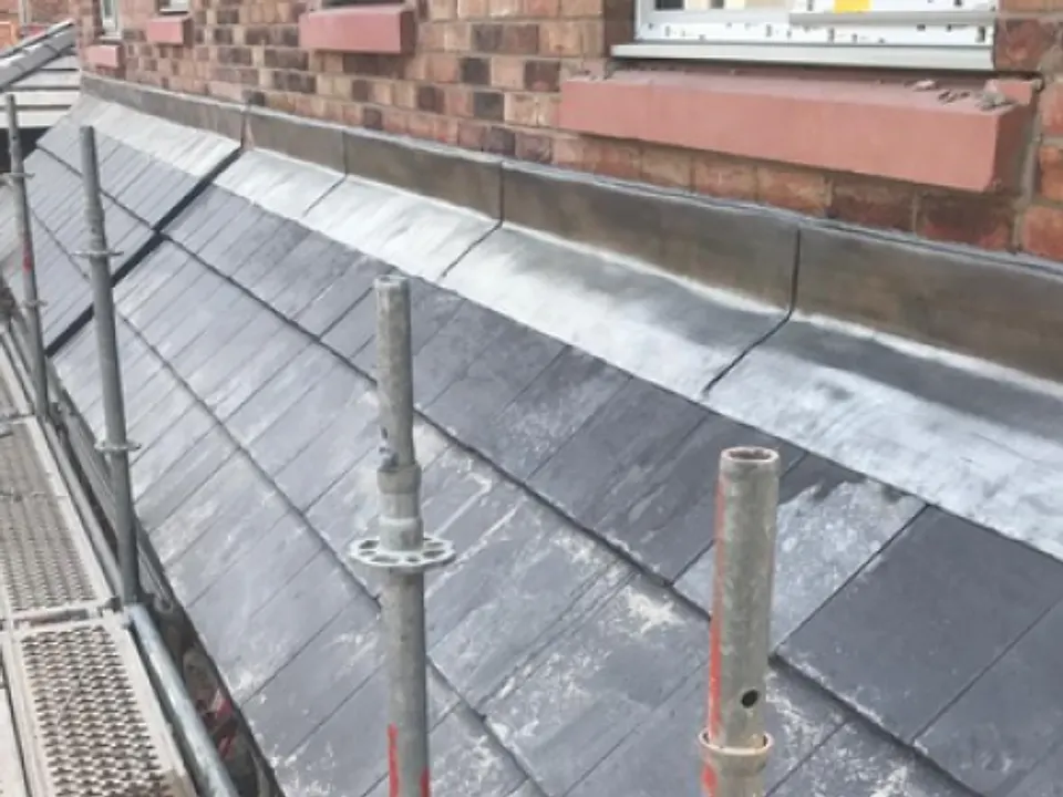 New slate roof with finished ridge line