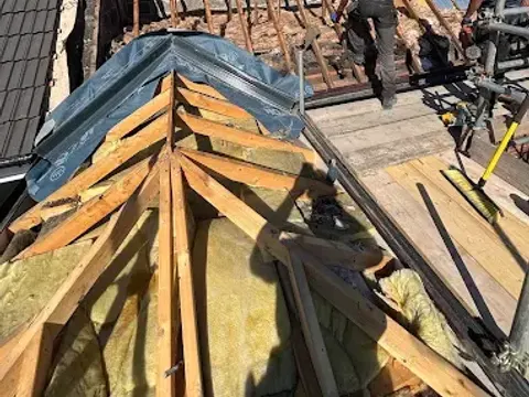 Roof stripped back to the timbers ready for new membrane and battens
