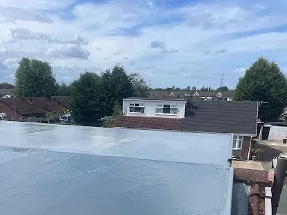 Wide flat roof with fresh grey covering